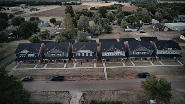 From the air at dusk: the six buildings along Logan Avenue